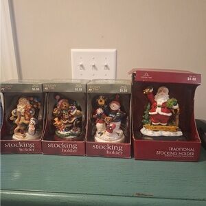 Holiday Time Festive Stocking Holder Set with Santa and Friends